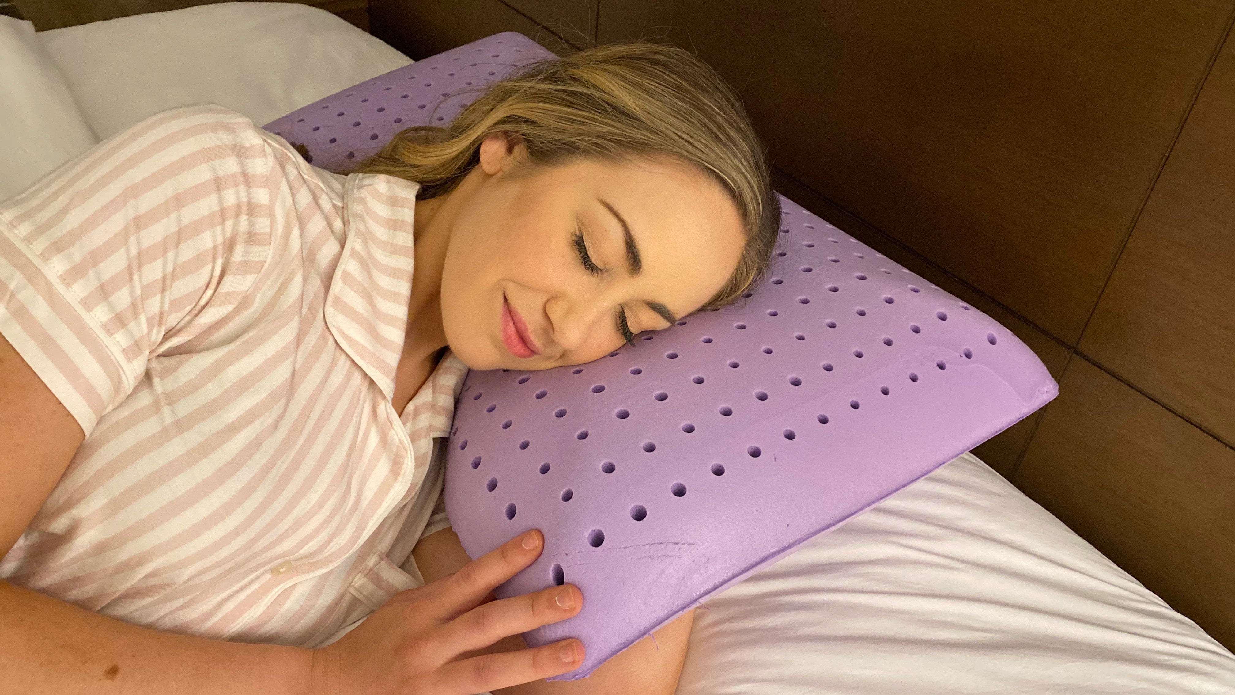 Woman sleeping comfortably on a Lavender Zen Pillow